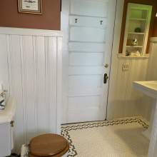 Vintage toilet, sink in Maids' Room bathroom